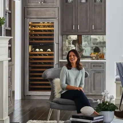 woman sitting in modern wood kitchen